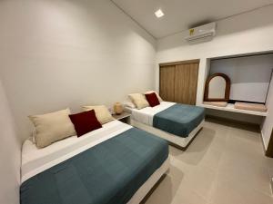 Giường trong phòng chung tại Casa Privada en Exclusivo Club Privado +30 ảnh