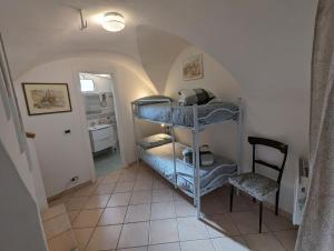 Posteľ alebo postele v izbe v ubytovaní La Casa degli Alberi