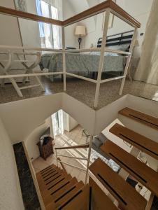 Posteľ alebo postele v izbe v ubytovaní La Casa degli Alberi