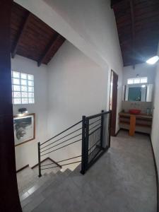 a hallway with a staircase in a building at Tantanakuy in Villa General Belgrano +5 photos