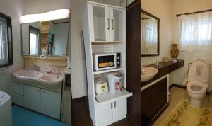 a bathroom with a sink and a toilet and a microwave at Lilac Hotels and Resorts - Vacation STAY 53215v in Kanoya