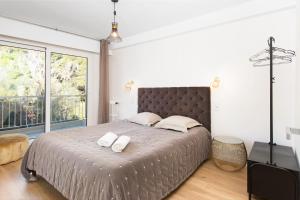 Ένα ή περισσότερα κρεβάτια σε δωμάτιο στο Luxueux - Terrasse vue mer - Parking privé - BO +24 φωτογραφίες