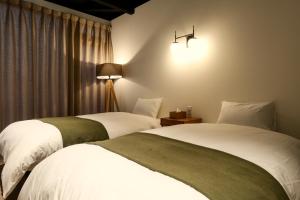 Säng eller sängar i ett rum på Fu - Vacation STAY 57381v
