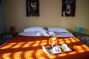 A bed or beds in a room at B&B Porta Nuova