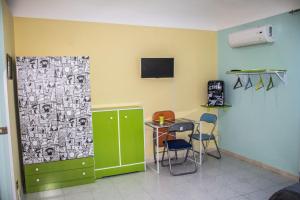 A television and/or entertainment centre at B&B Porta Nuova