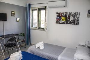 A television and/or entertainment centre at B&B Porta Nuova