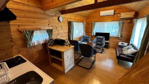 an overhead view of a living room in a log cabin at Asahikawa City - Camp - Vacation STAY 62748v in Chikabumichō