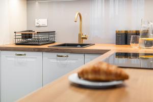 Kuchyňa alebo kuchynka v ubytovaní Atena Premium - BillBerry Apartments