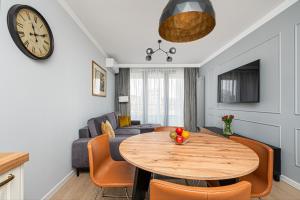 Televízia a/alebo spoločenská miestnosť v ubytovaní Atena Premium - BillBerry Apartments