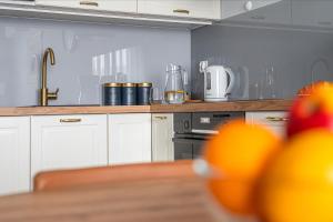 Kuchyňa alebo kuchynka v ubytovaní Atena Premium - BillBerry Apartments
