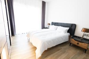 Postel nebo postele na pokoji v ubytování Harmonija SPA RESORT