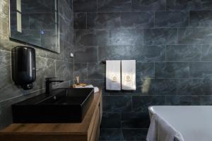 Kuchyň nebo kuchyňský kout v ubytování Harmonija SPA RESORT