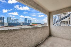 a balcony with a view of a city skyline at Trinity Suite 2b 2b Strip View in Las Vegas