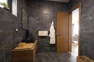 Koupelna v ubytování Harmonija SPA RESORT