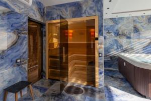 Koupelna v ubytování Harmonija SPA RESORT