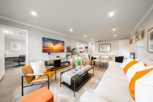 a living room with a white couch and a table at 4BR Lux Los Gatos Home: Style & Comfy in Los Gatos