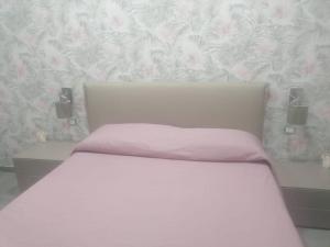 Katil atau katil-katil dalam bilik di Casa vacanze indipendente in campagna