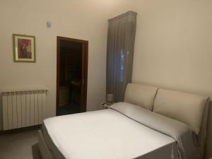Postel nebo postele na pokoji v ubytování Villa Elena + 13 fotografií