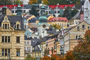 a group of buildings in a city at Imperial Apartment in Bohemia Residence by Rentez in Karlovy Vary