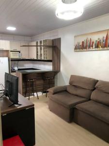 Un lugar para sentarse en Casa com AR COND. em todos os comodos mobiliada