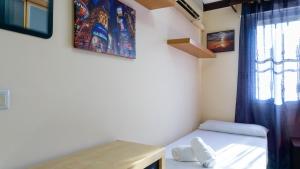 Posteľ alebo postele v izbe v ubytovaní Apartment Aconte Malaga