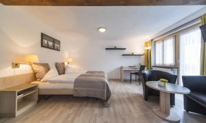 Voodi või voodid majutusasutuse Relais Bayard toas
