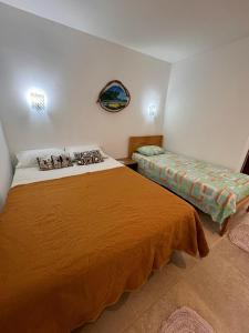 Lova arba lovos apgyvendinimo įstaigoje Taiba Beach Resort - Ap 106 BL A - IMOB TEMPORADA