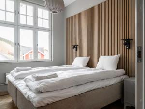 Ένα ή περισσότερα κρεβάτια σε δωμάτιο στο Are Ski Sanctuary Apt for 4 with Slope Access