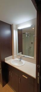 a bathroom with a sink and a large mirror at Wind Rose Study Xàbia in Jávea +38 photos