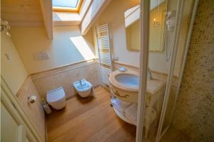 Koupelna v ubytování Garda Residence San Vigilio Golf