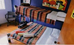 Llit o llits en una habitació de ZIPA HOSTEL