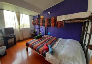 Llit o llits en una habitació de ZIPA HOSTEL