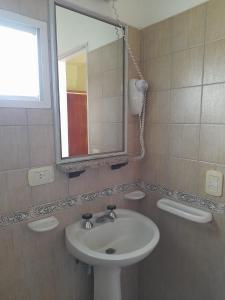 Um banheiro em Hotel Boiano