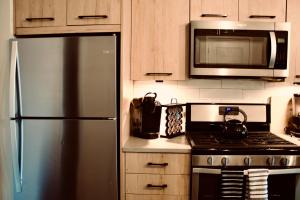 Kjøkken eller kjøkkenkrok på Upscale Luxury Fully loaded Equipped Loft