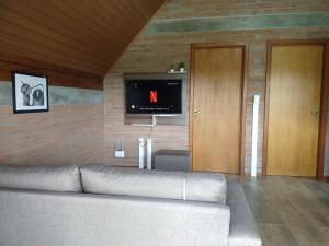 TV/trung tâm giải trí tại Refúgio Verde