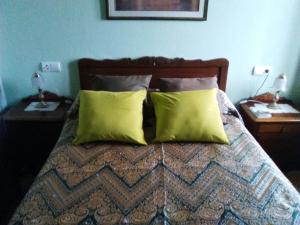 A bed or beds in a room at Hospedaje - Ferrería Quintá
