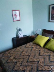 A bed or beds in a room at Hospedaje - Ferrería Quintá