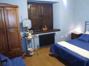 A bed or beds in a room at Hospedaje - Ferrería Quintá
