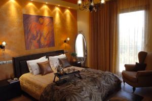 Posteľ alebo postele v izbe v ubytovaní Olympic Fashion Hotels