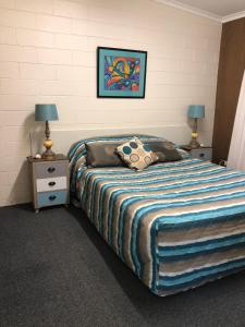 Cama ou camas em um quarto em Silver Bream Four