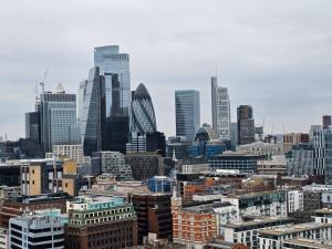 a view of a city with tall buildings at Apartment Near Towerbridge in London