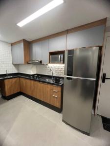 Kuchyň nebo kuchyňský kout v ubytování Apto novinho na Barra Funda próximo Allianz I