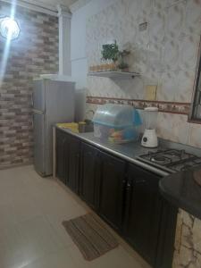 Dapur atau dapur kecil di Apartahotel Mar Azul