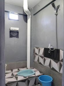 Posezení v ubytování RINA Guest House Pacitan