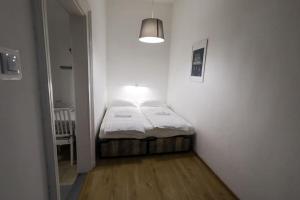 Krevet ili kreveti u jedinici u okviru objekta Pest-port apartment room-6 Private apartment