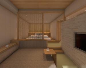 um quarto com uma televisão e um quarto com uma cama em Rangetsu em Quioto
