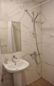 Koupelna v ubytování Rilena Hotel
