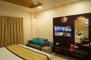 TV a/nebo společenská místnost v ubytování Marshall The Grand Hotel