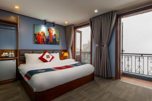 Tempat tidur dalam kamar di Sapa View Spring Garden Hotel