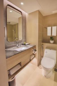 Kopalnica v nastanitvi Wyndham Singapore Hotel
